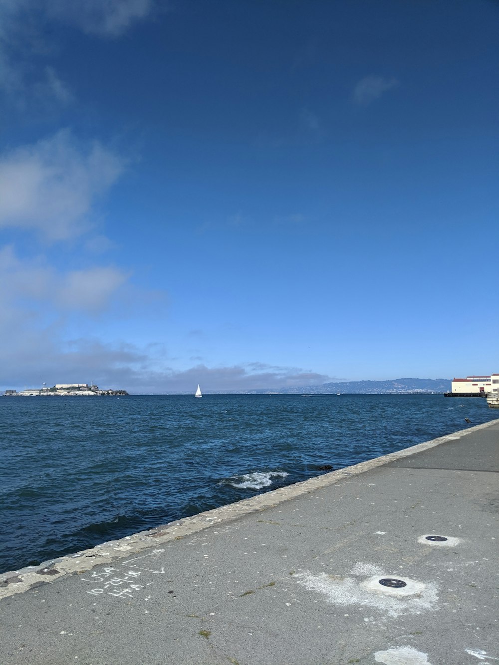 blue sea under blue sky during daytime