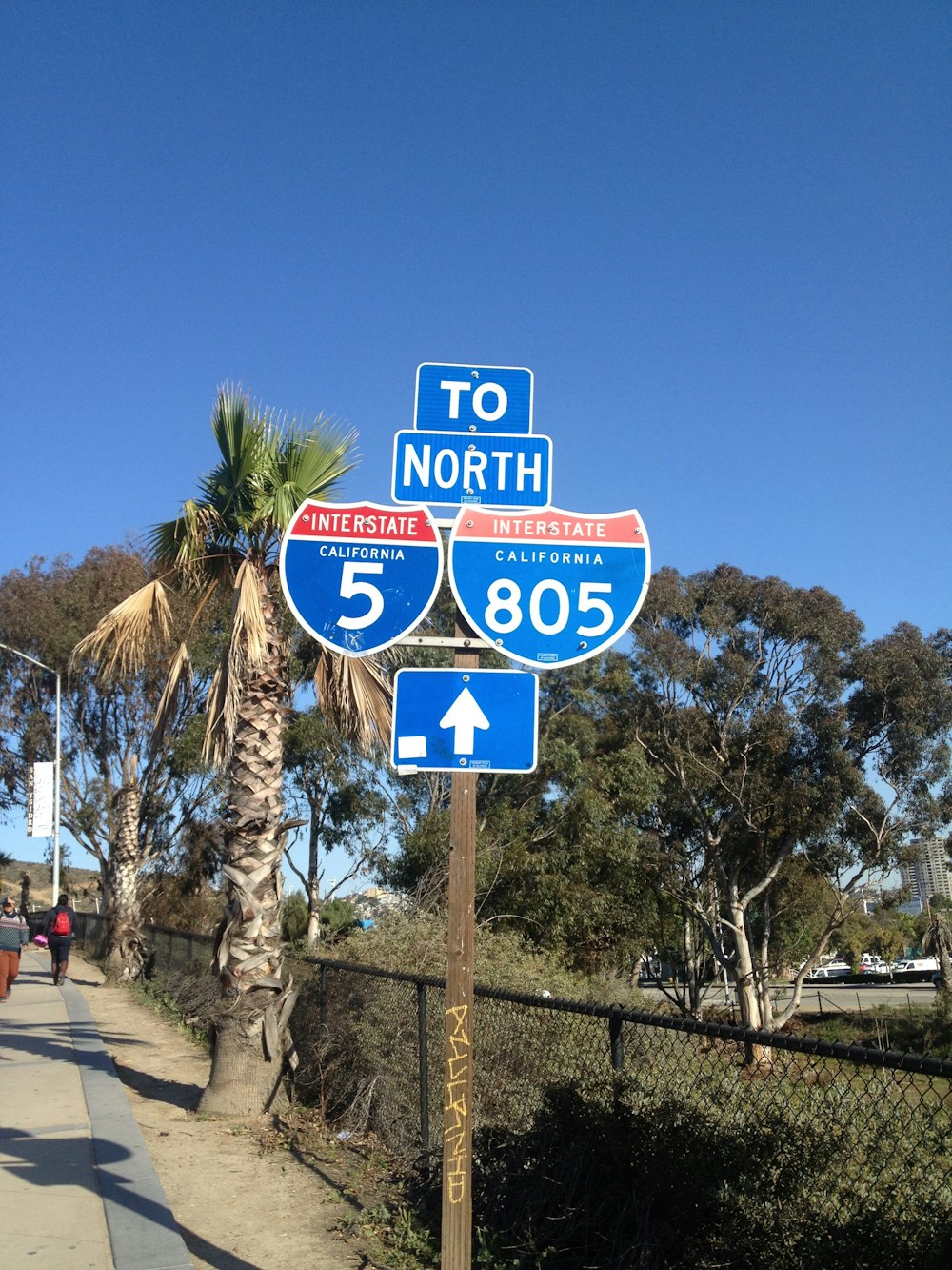 blue and white stop sign