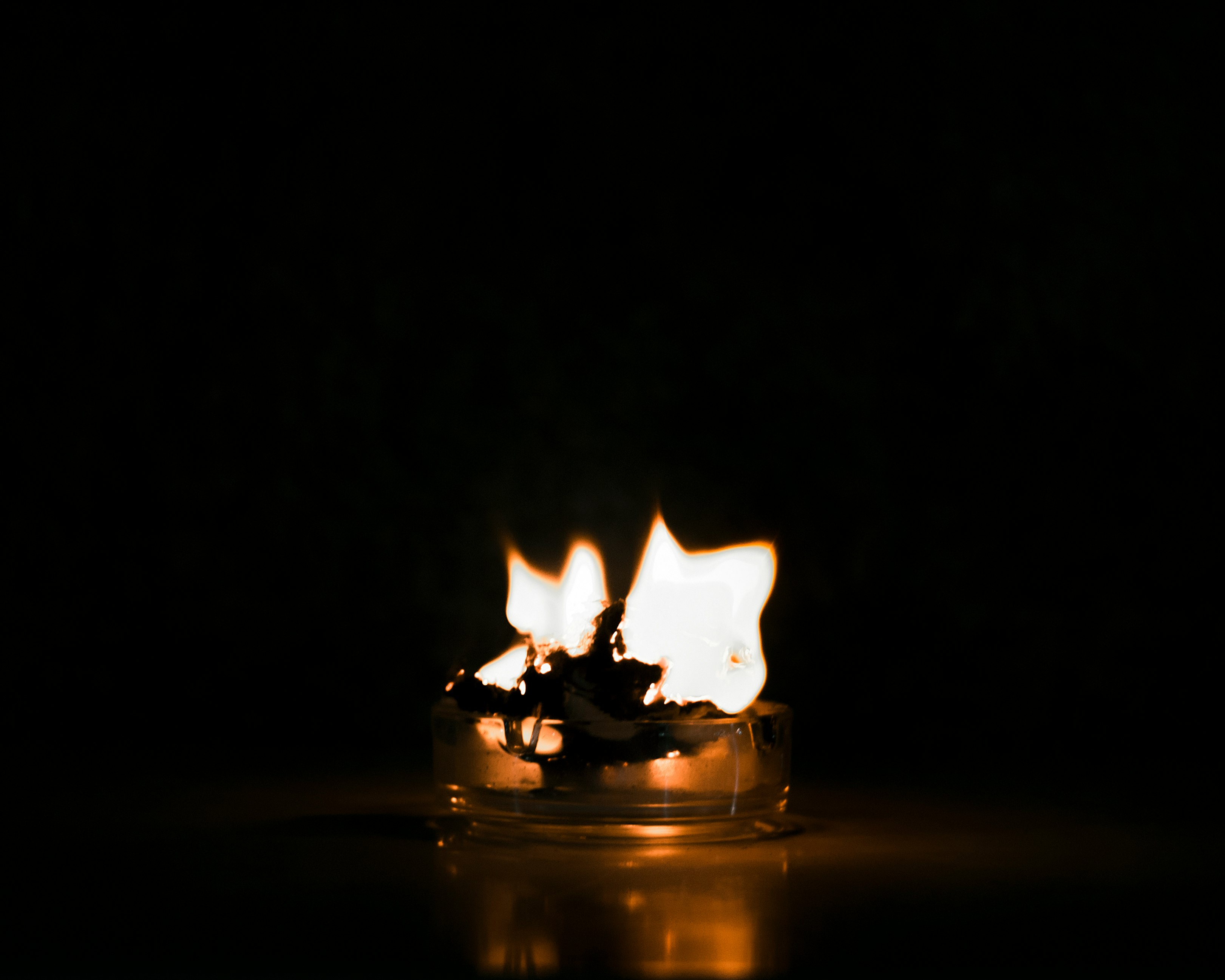 fire in clear glass with black background