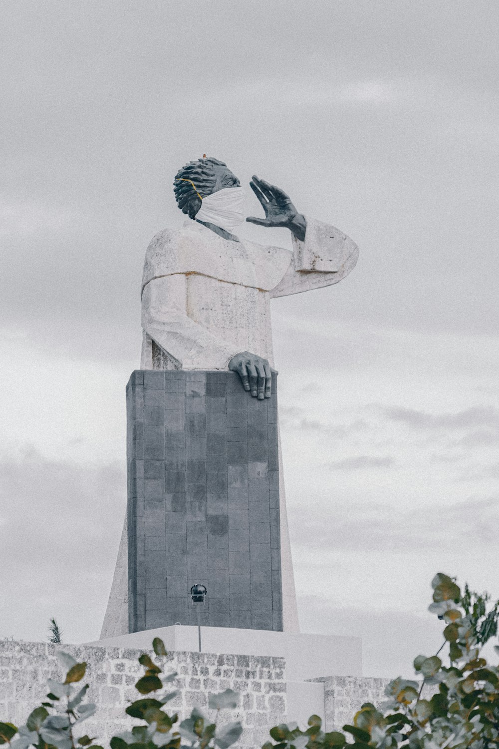 gray concrete statue of man