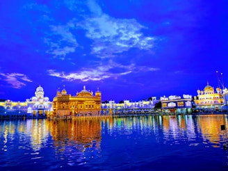 A serene temple courtyard bathed in soft golden light during early morning prayers.