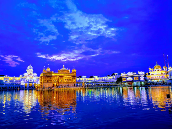 A serene temple courtyard bathed in golden sunlight during a vibrant festival celebration.