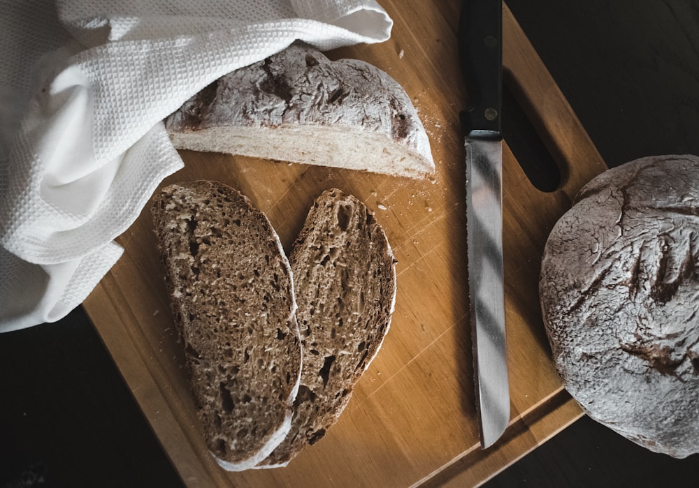 brown bread on brown wooden chopping board