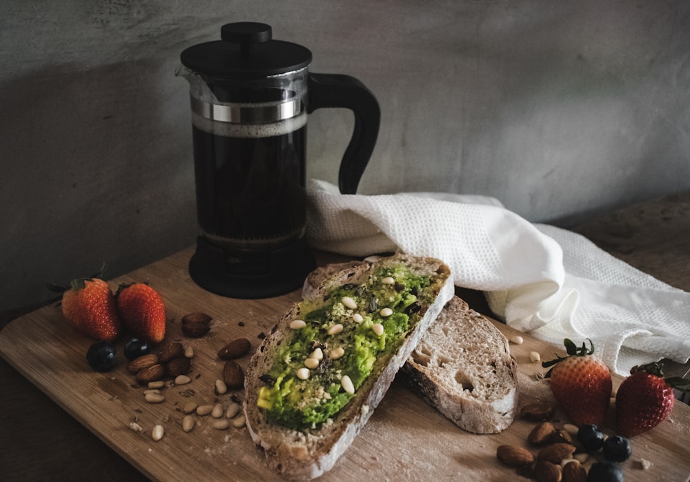 bread with vegetable and bread on brown wooden chopping board