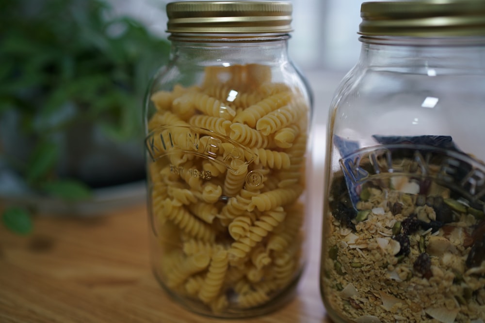 brown beans in clear glass jar