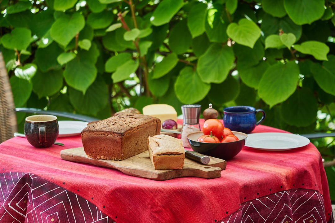 brown bread on red table cloth