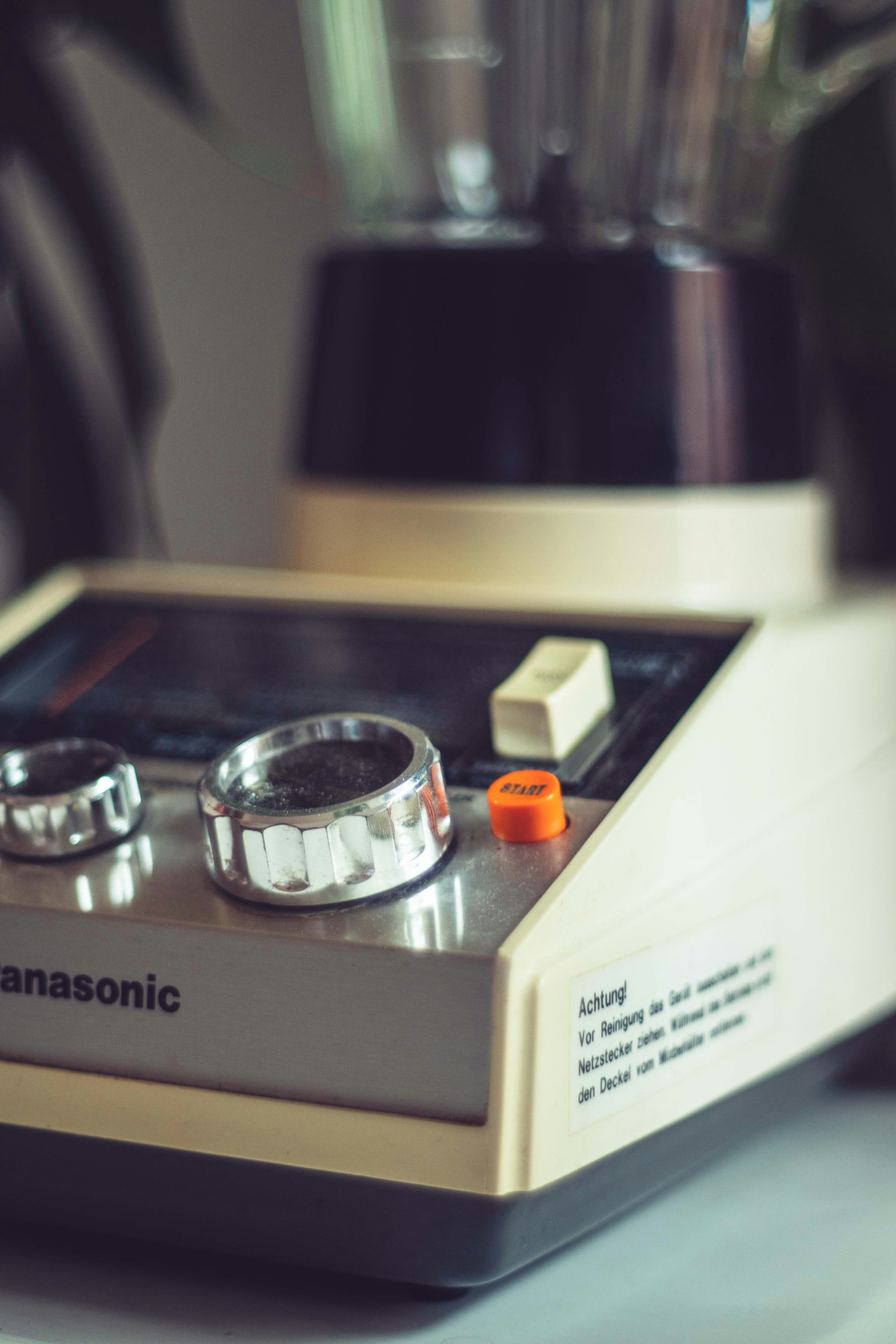 silver and orange ring in box