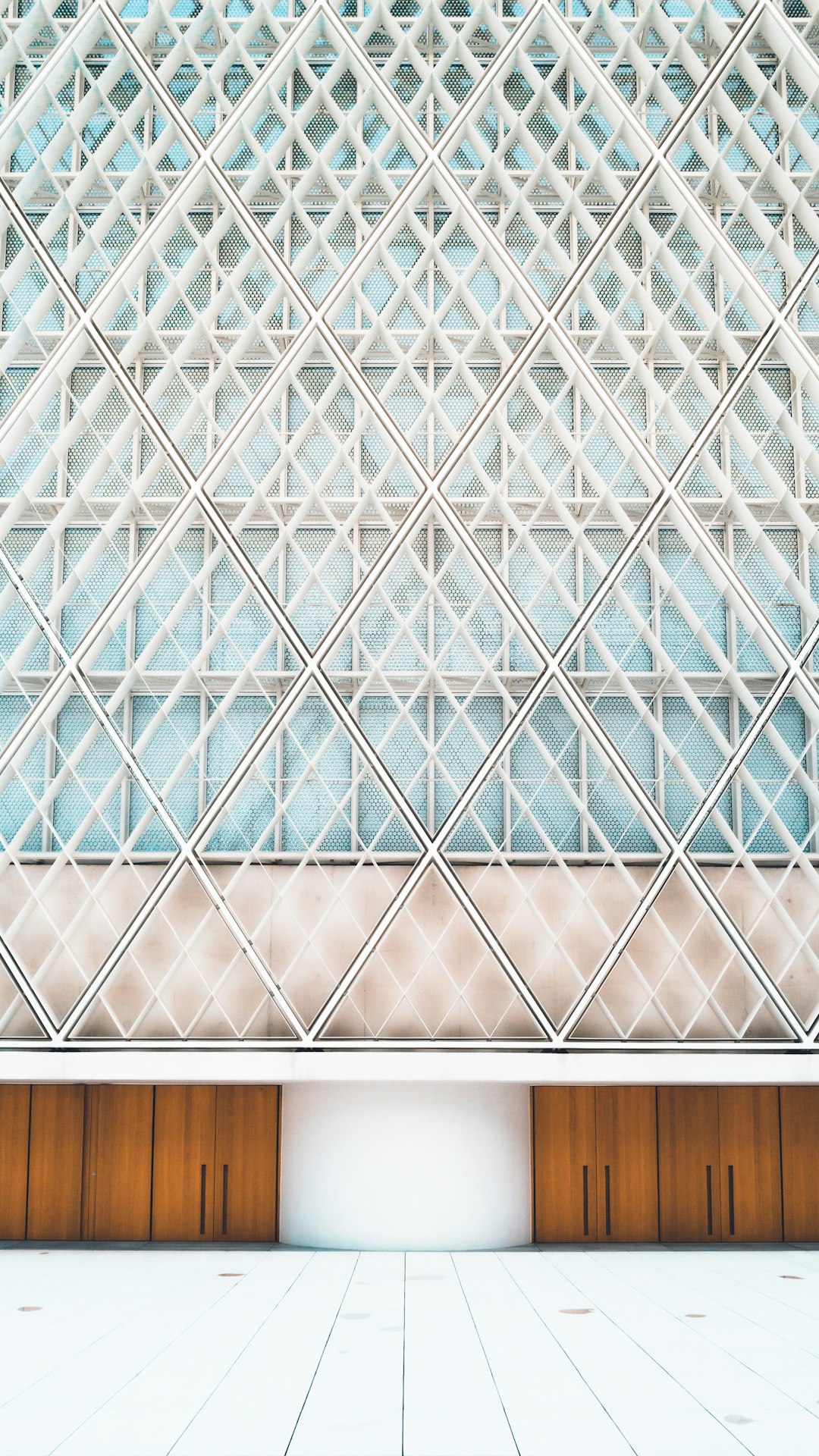 white and blue glass walled building