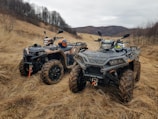 black and gray atv on brown field during daytime on ATV tyres sold at the tyrepublic tire shop