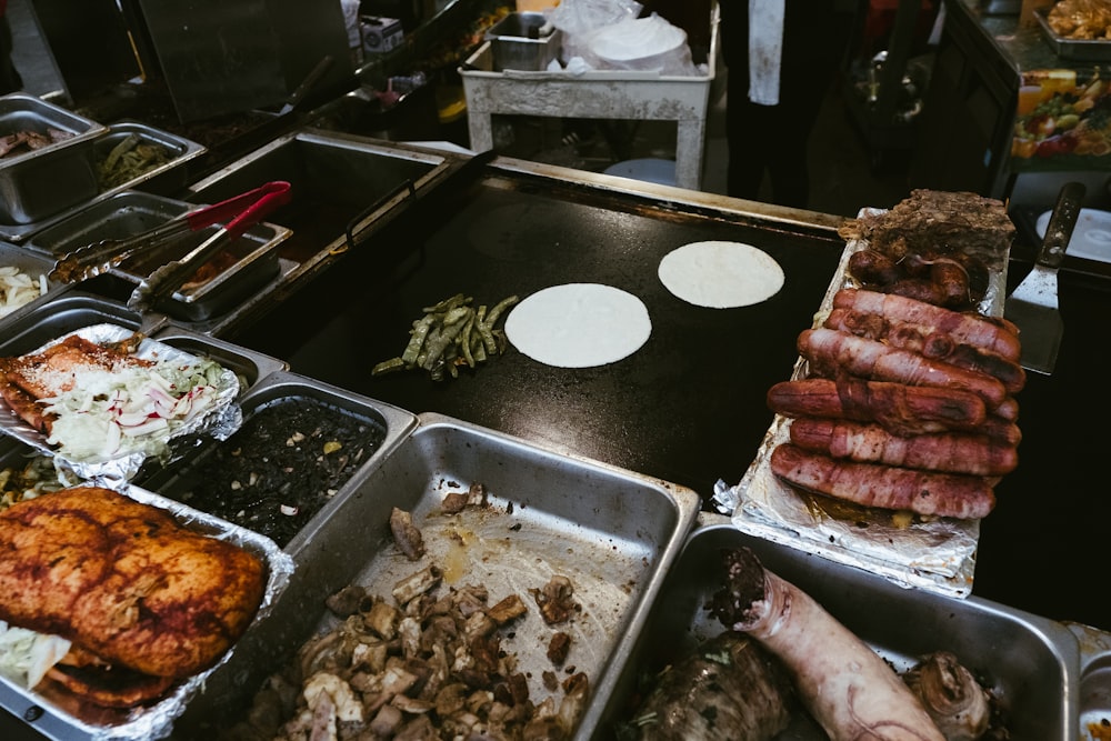 grilled meat on black tray