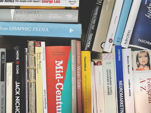 books on black wooden shelf