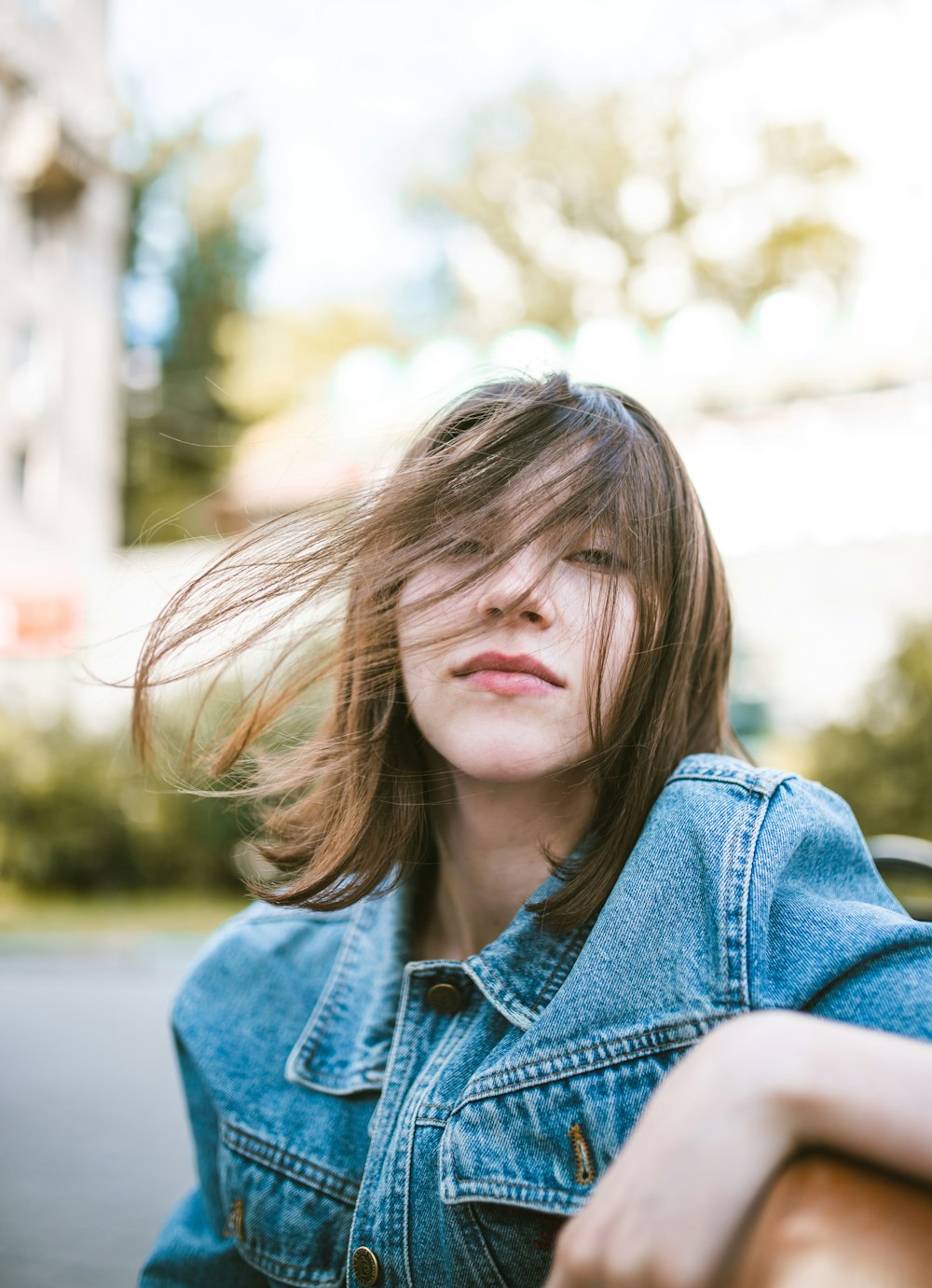 woman in blue denim jacket