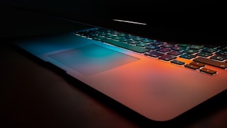 Close-up of a travel tech gadget glowing softly with blue and white gradients.