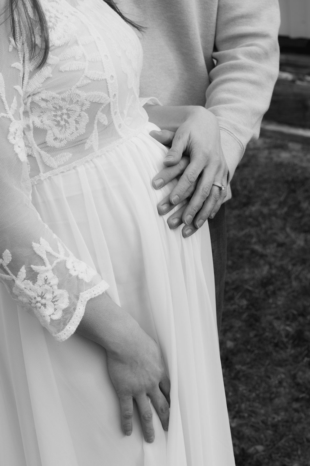 grayscale photo of woman in long sleeve dress