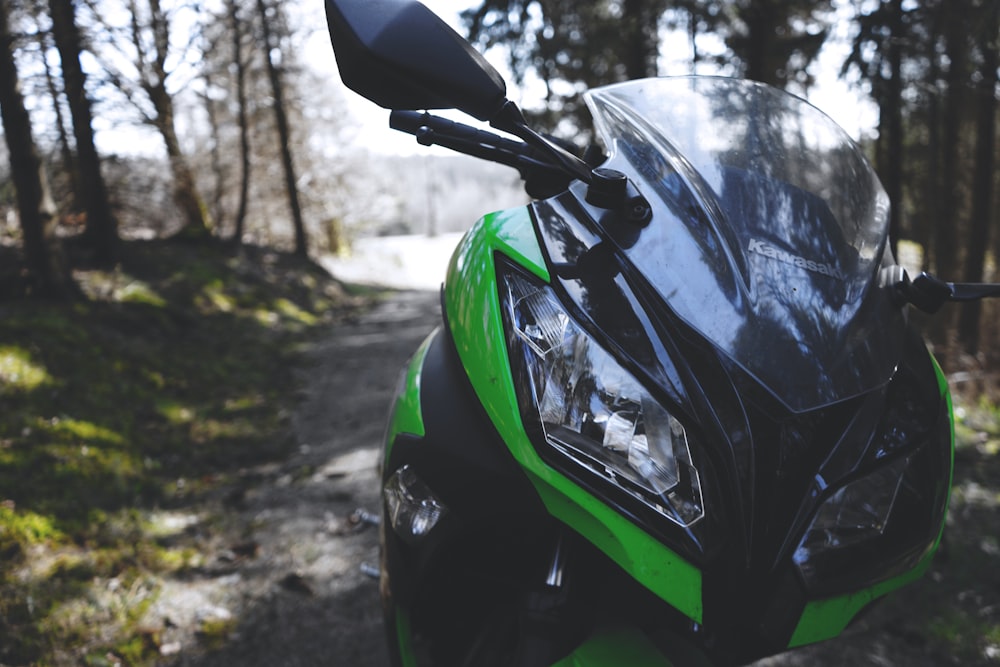 green and black motor scooter