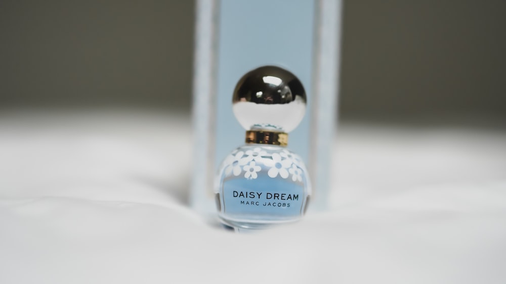 blue and white glass perfume bottle