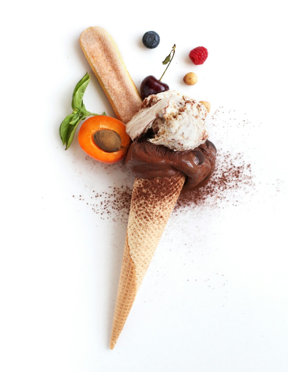 brown ice cream cone with ice cream and sliced tomato