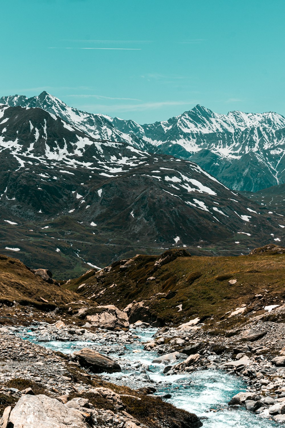 snow covered mountain during daytime