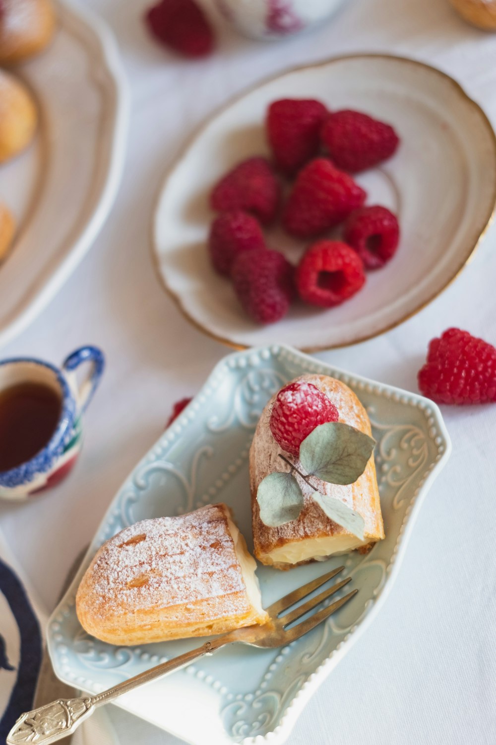 strawberry cake on white ceramic plate