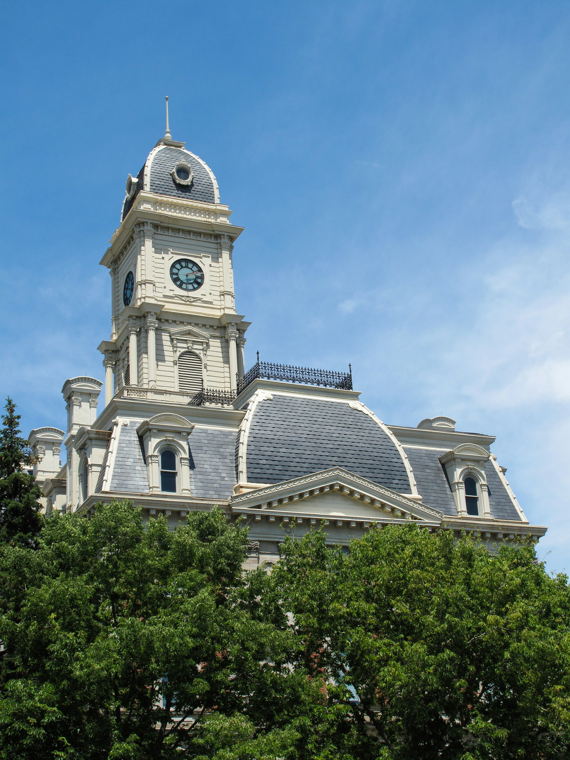 white and gray concrete building under blue sky during daytime