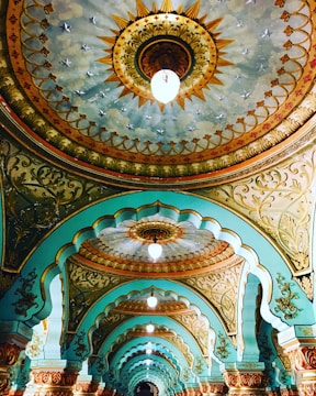 An elegant ceiling featuring intricate patterns and lighting.