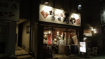 Cozy interior of a Hoka-Hoka Bento restaurant bustling with happy customers enjoying their meals.