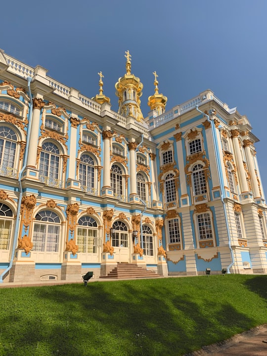 beige concrete building during daytime in Catherine Palace Russia
