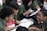 A group of students engaged in a theological discussion.