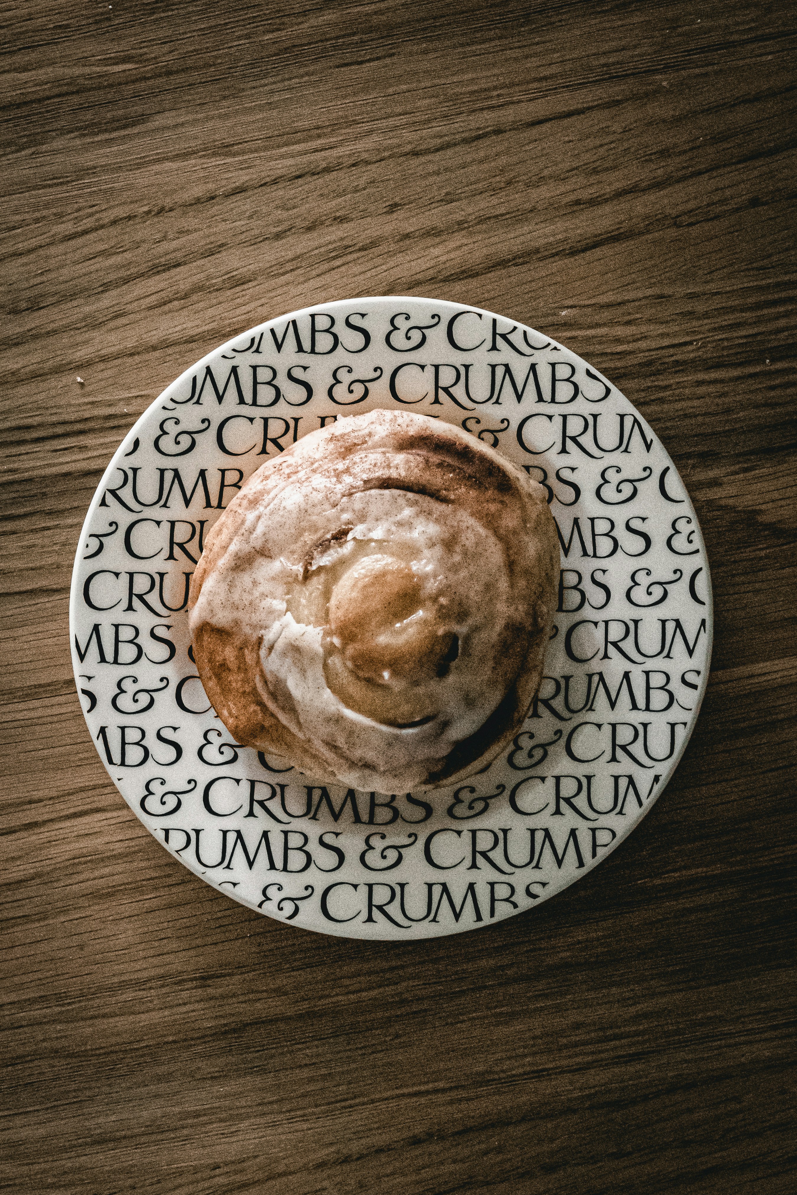 bread on white and blue floral ceramic plate