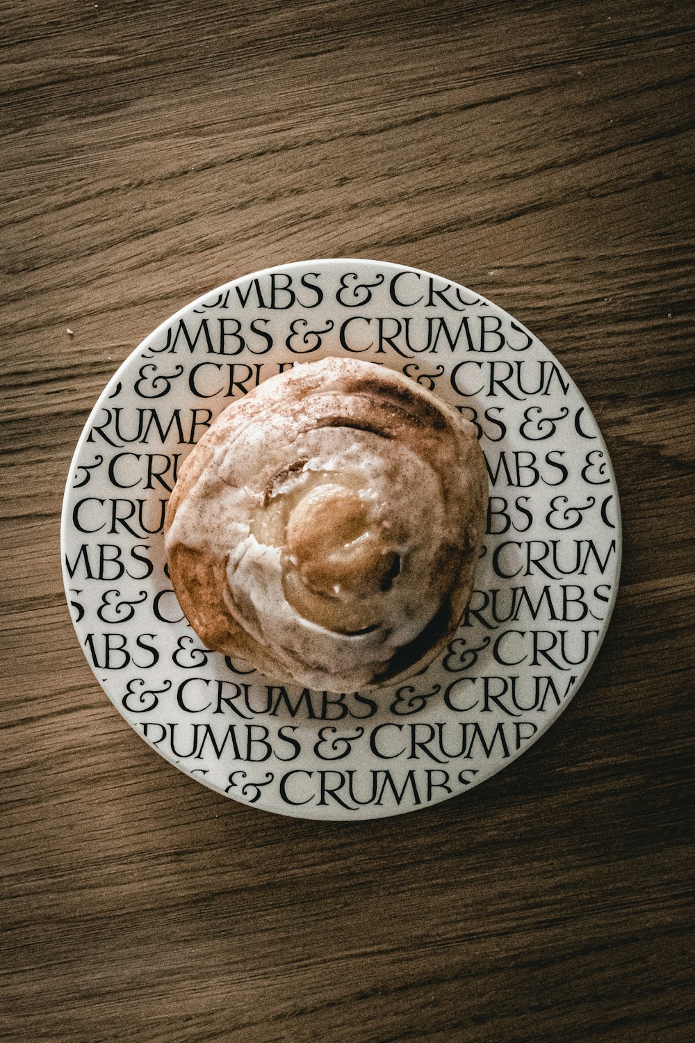 bread on white and blue floral ceramic plate