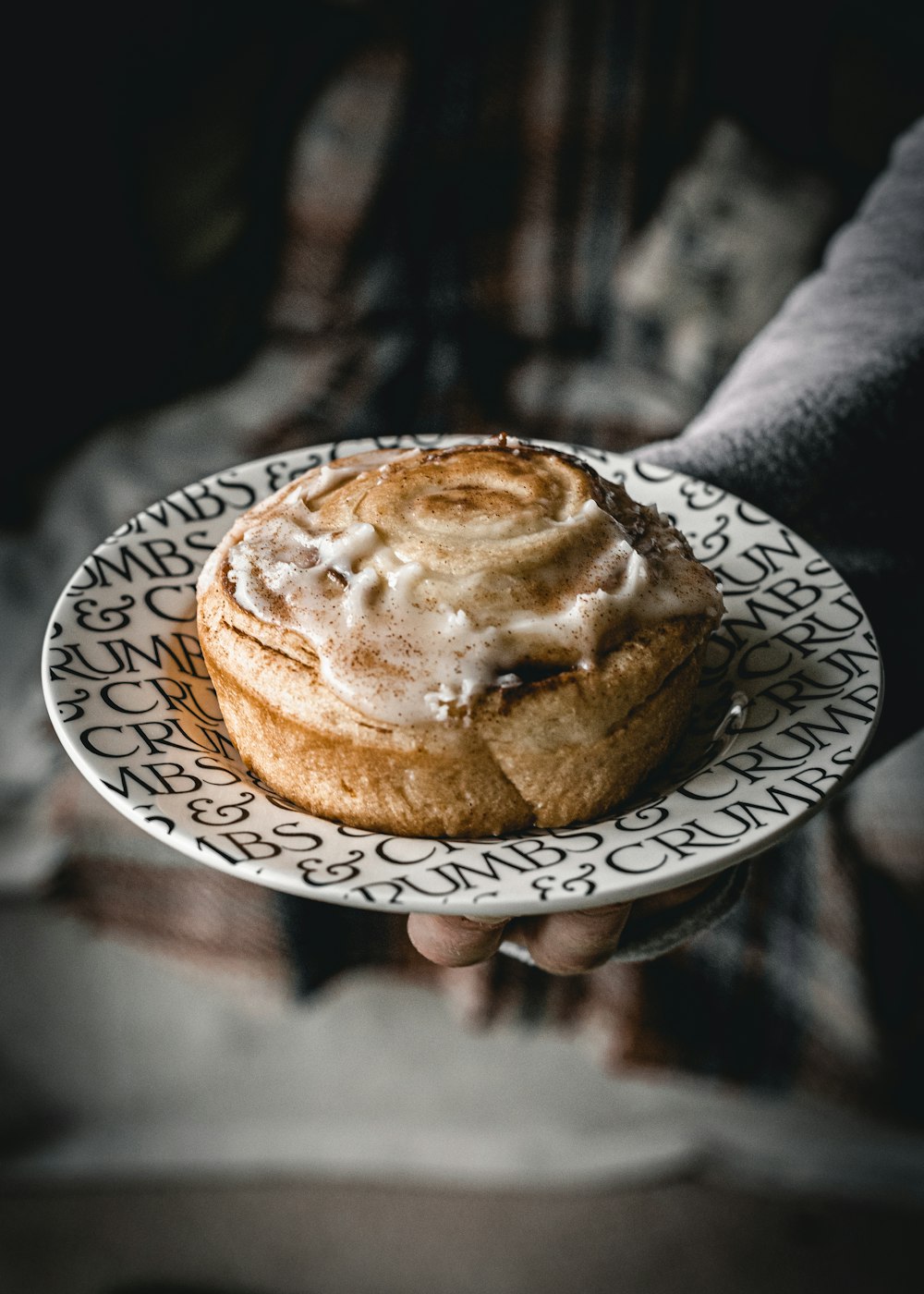 brown pastry on white and blue ceramic round plate