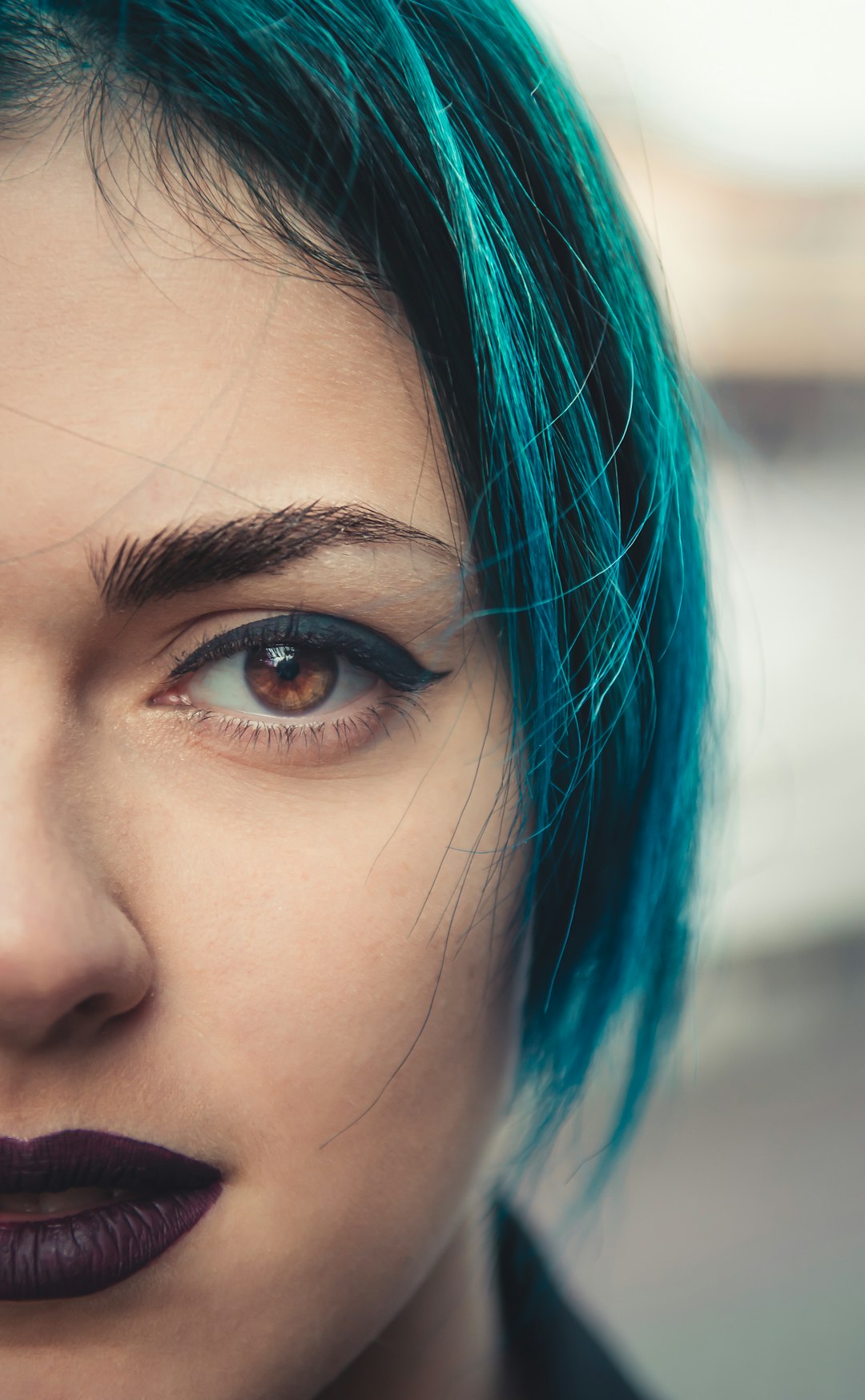 woman with blue hair and blue eyes