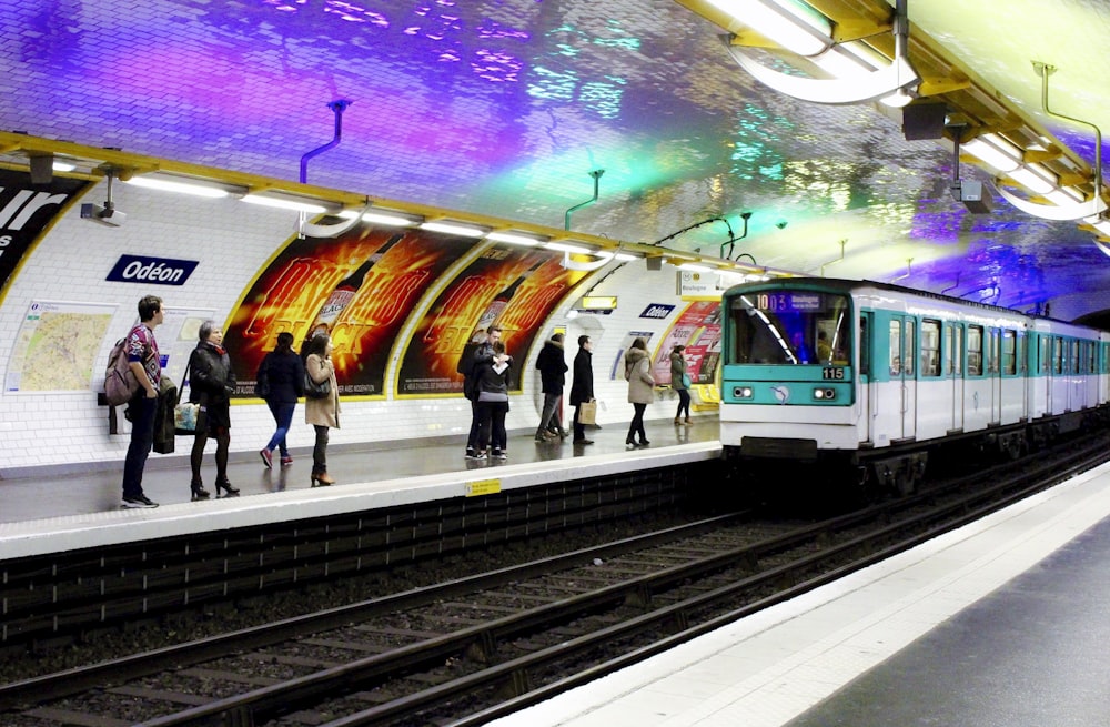 people walking on train station