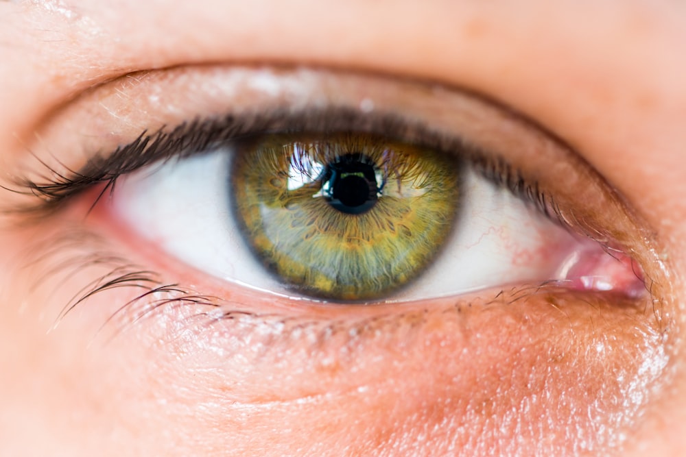 persons eye in close up photography