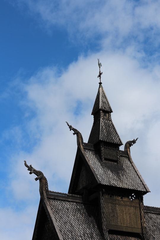 black concrete church under blue sky in Hopperstad Stave Church Norway
