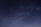 A serene image of a man gazing thoughtfully at a starry night sky.
