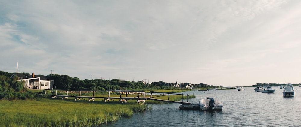 a body of water with boats floating on top of it