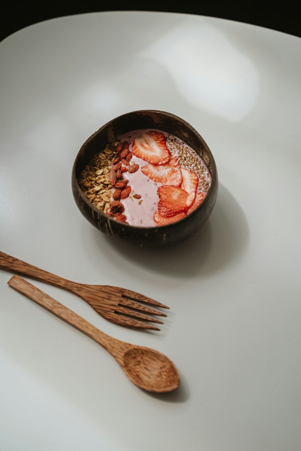 black ceramic bowl with red liquid