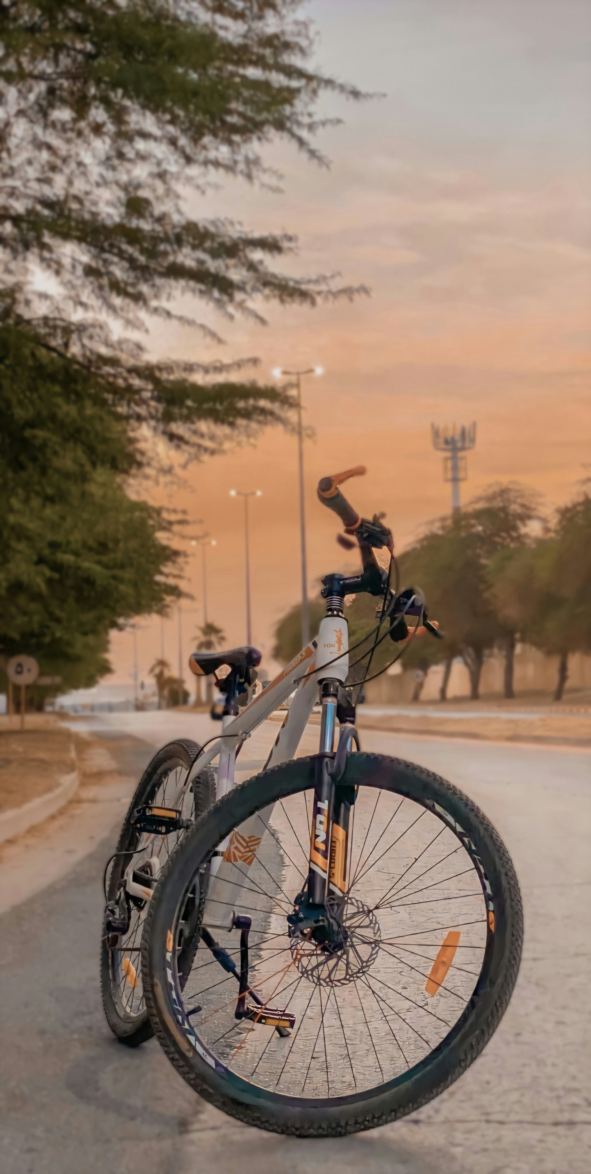black and white bicycle on road during daytime