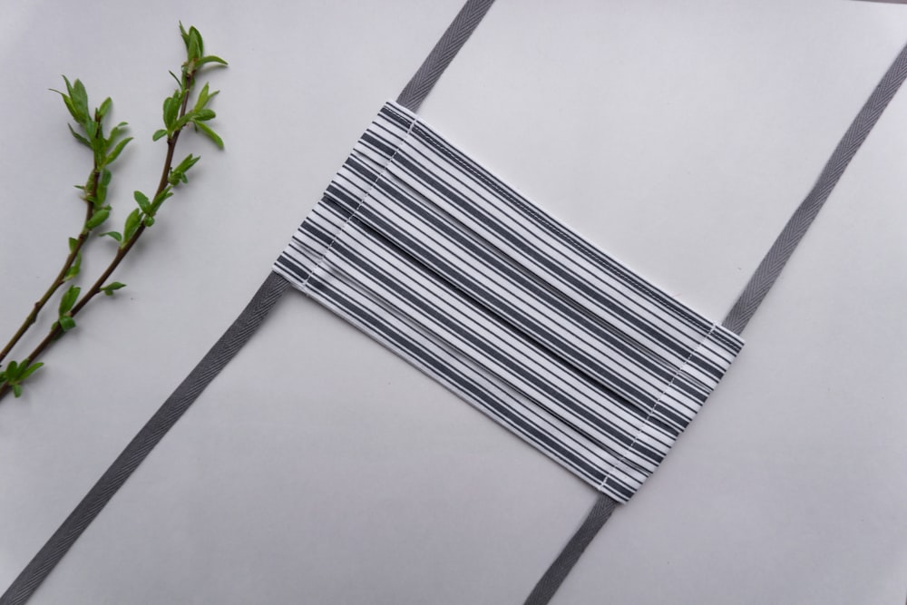 white and black striped textile