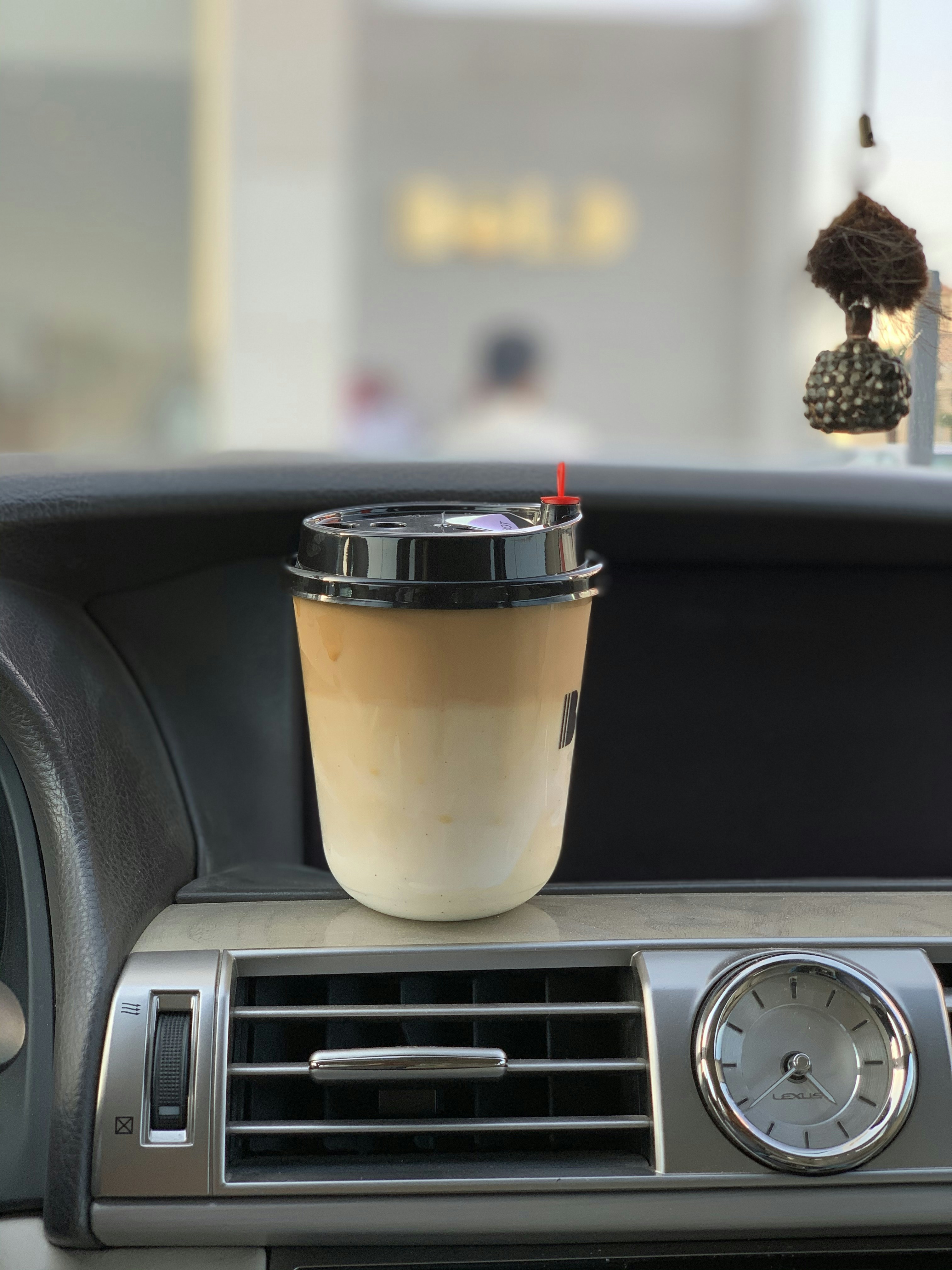 Travel mug in a car cup holder