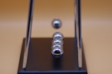 silver and gold steel tool
