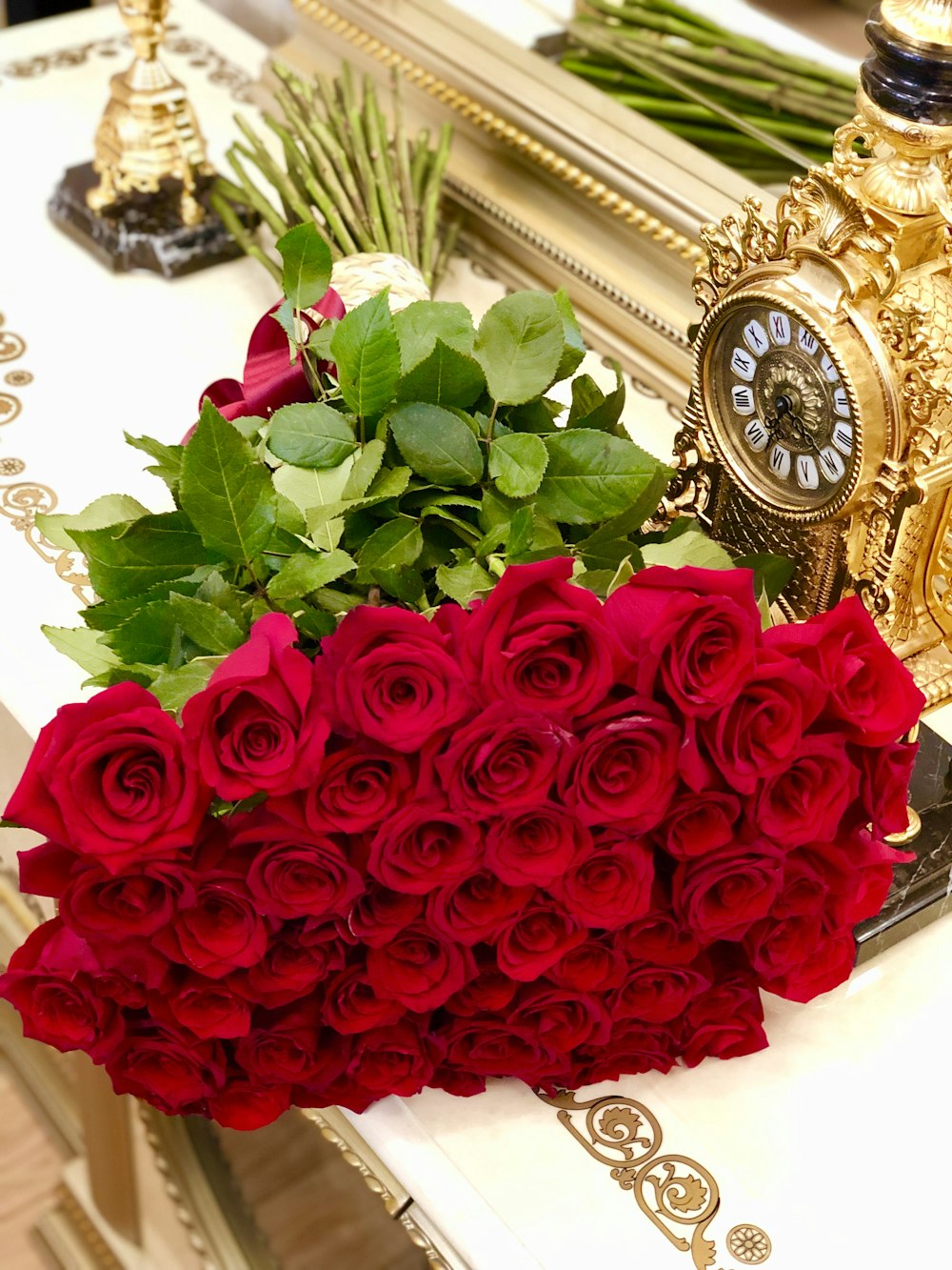 red roses bouquet on white table