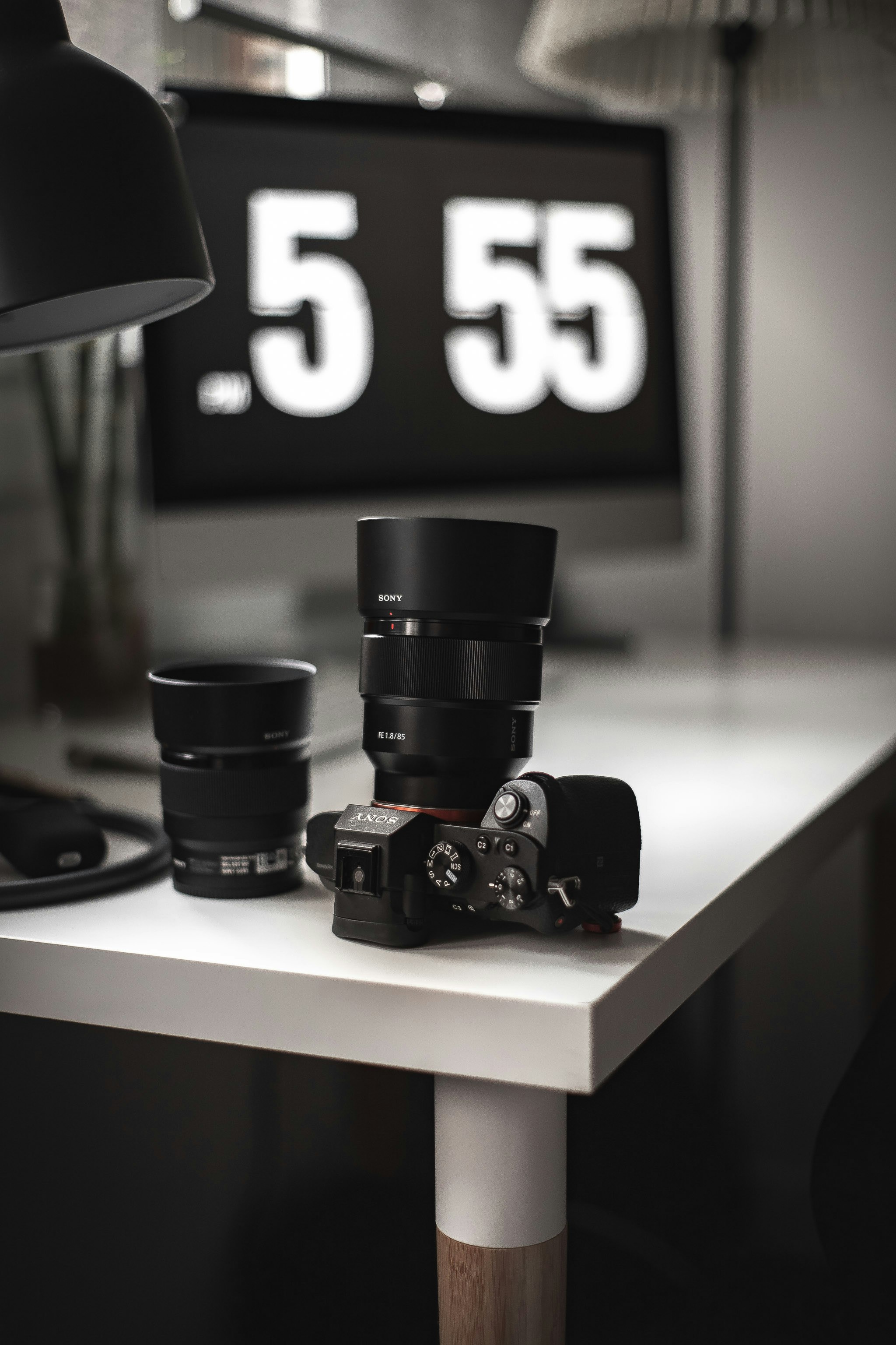 black and red lego blocks on brown wooden table