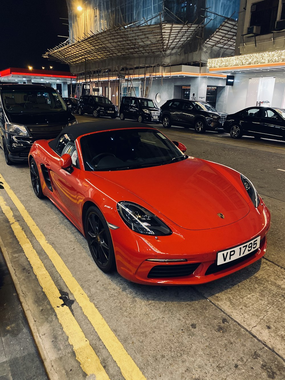 red ferrari 458 italia parked on parking lot