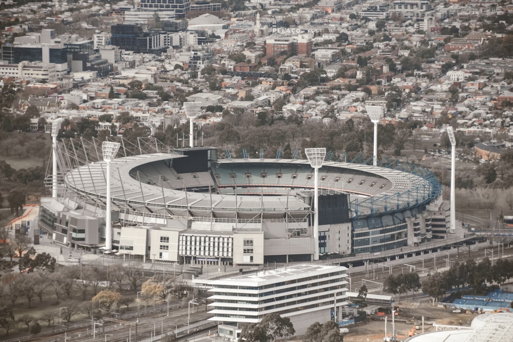 an aerial view of a soccer stadium in a city