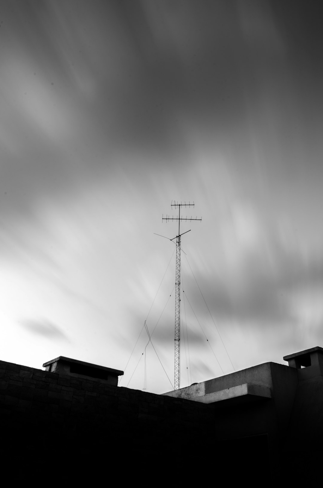 grayscale photo of wind turbine