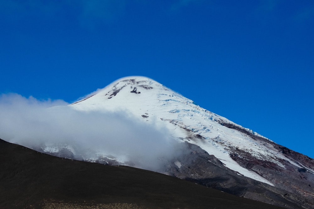 white and black mountain under blue sky during daytime