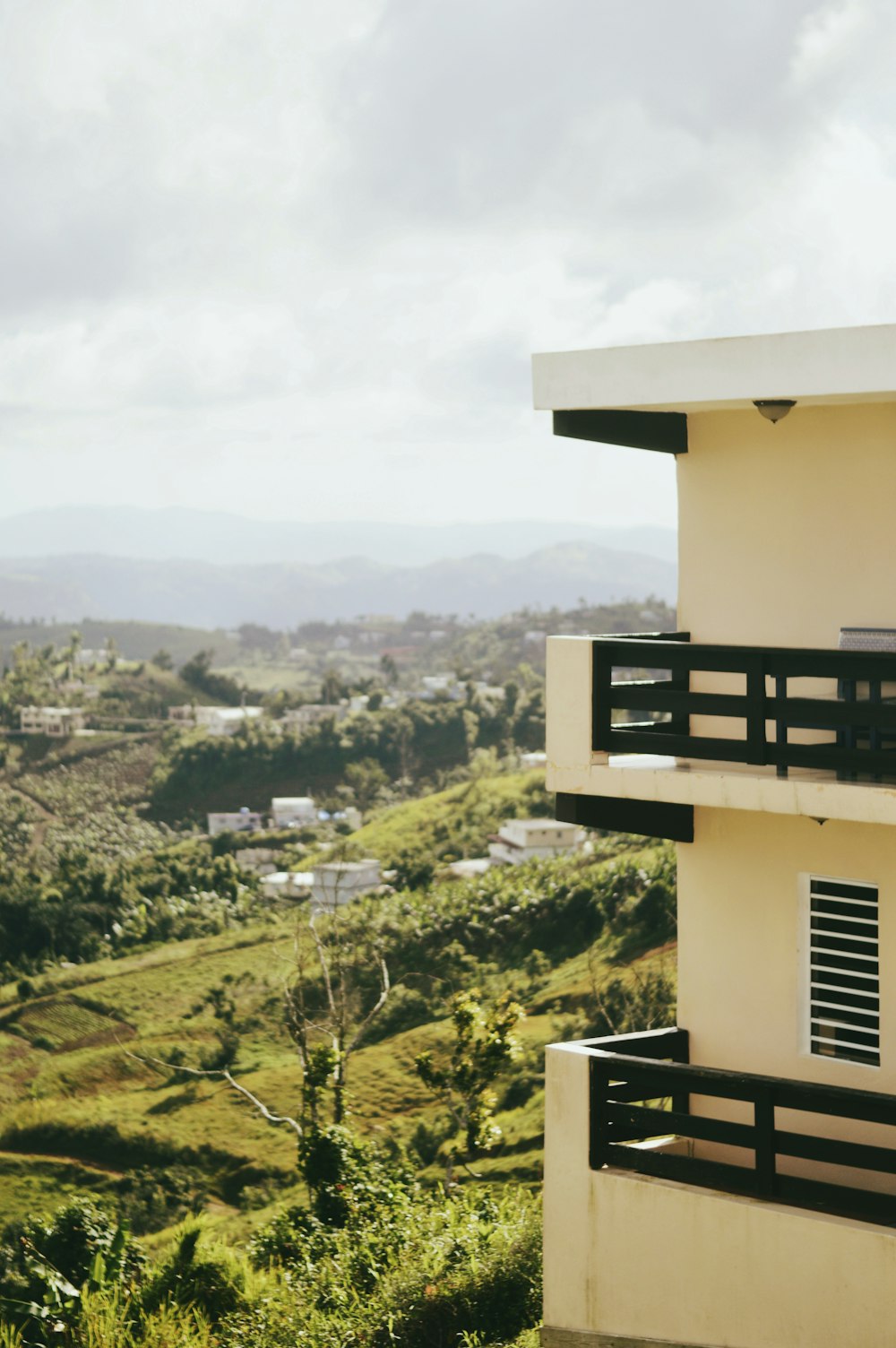 white concrete building on top of mountain during daytime