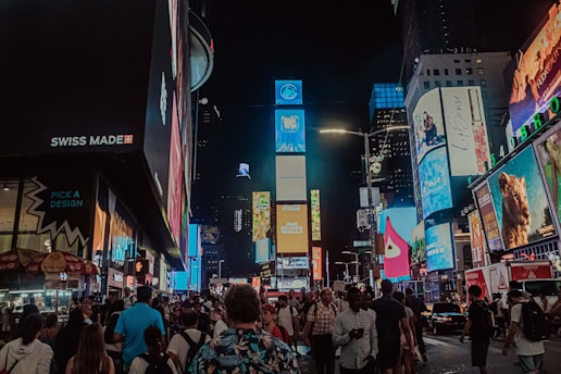 A vibrant image showing a bustling job market in a Middle Eastern city with people searching job listings on mobile devices.